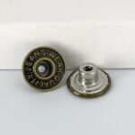 BLN05-17MM Botón perforado pavón