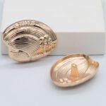 F-A0226 Herraje Botón Caracol Dorado - Imagen 2